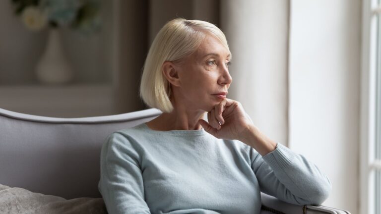 Woman sitting peacefully at home