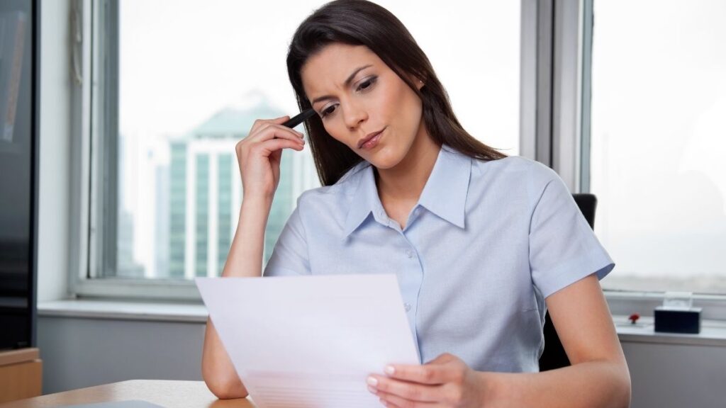 Woman reading papers