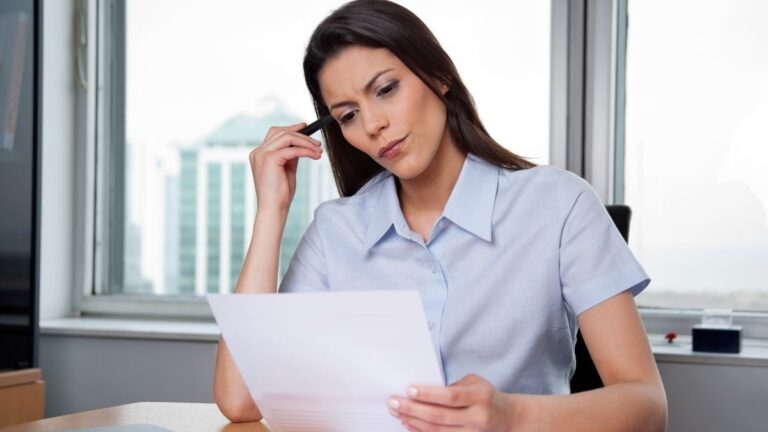 Woman reading papers